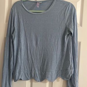 Francesca’s blue sweater